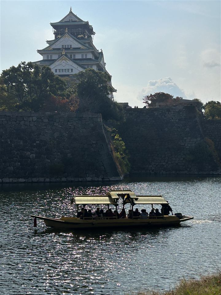 A tourist boat on the moat below Osaka Castle