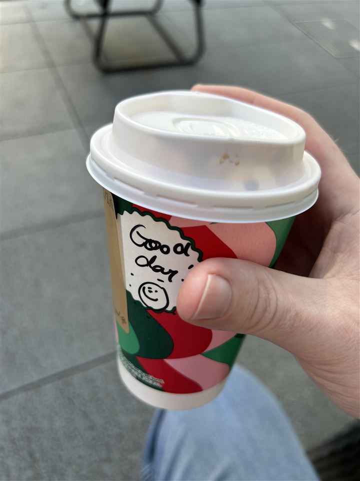Starbucks Japan holiday cup with a handwritten Good day message and a smiley face